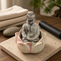 bouddha sur sa fleur de lotus