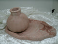 A small storage box and its little vase